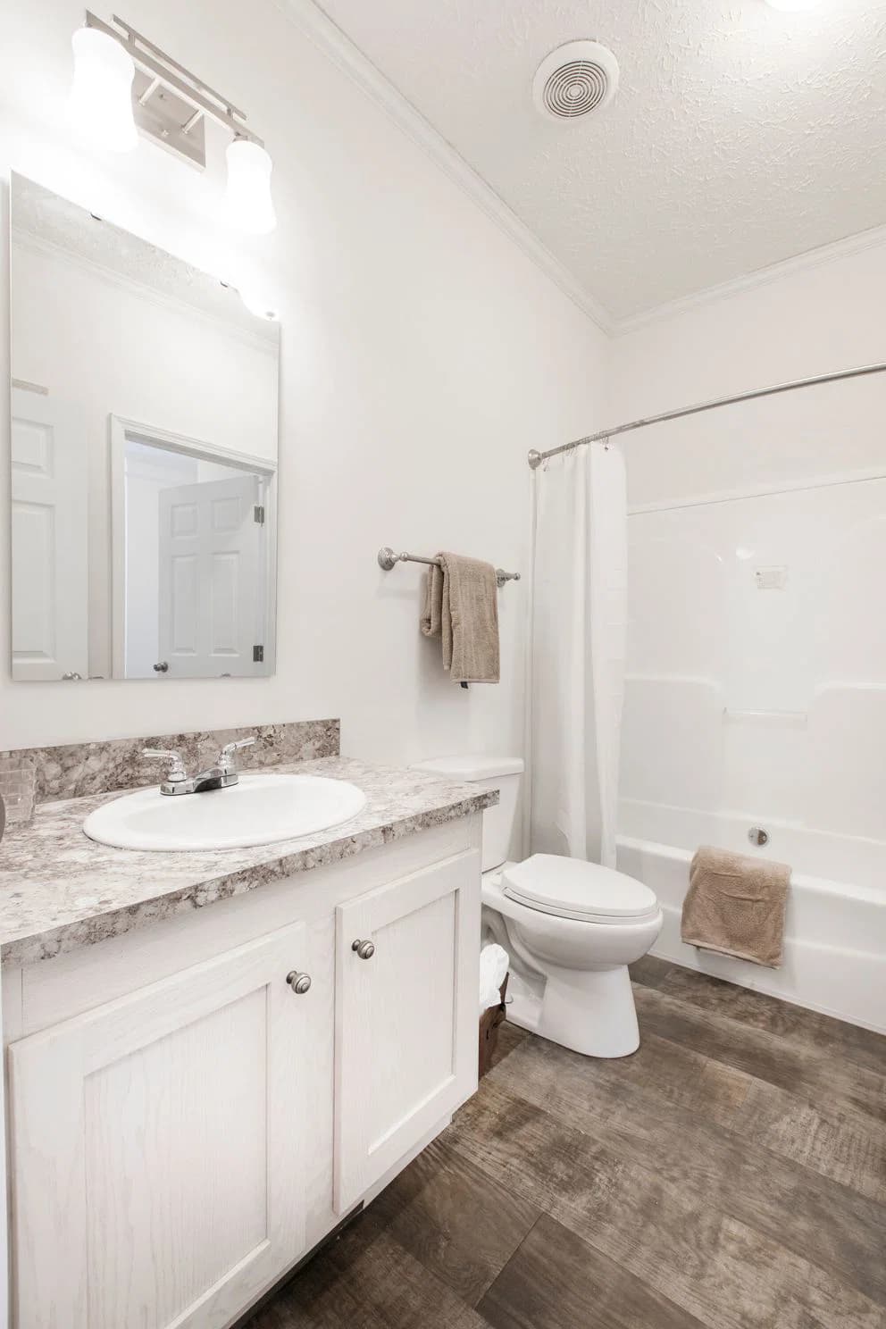 The whitecap mod bathroom home features