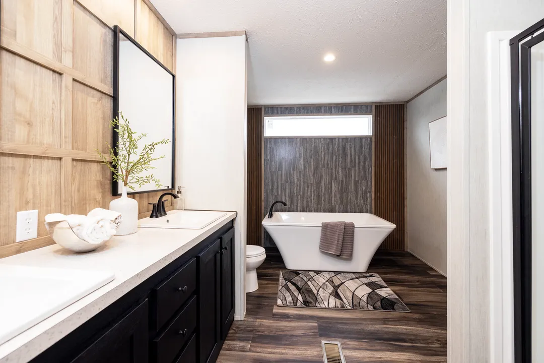 The dark sands bathroom home features